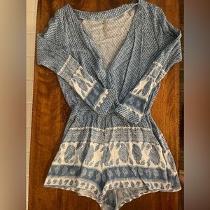 Blue romper with pockets. Beautiful button detail. Size small